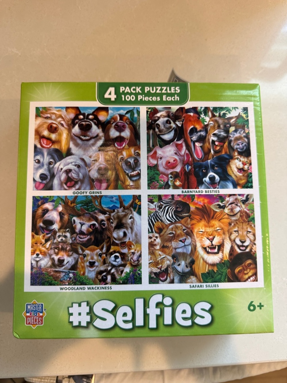 #Selfies 4-Pack 100-Piece Puzzles - Green Box, good for kids learning to puzzle.